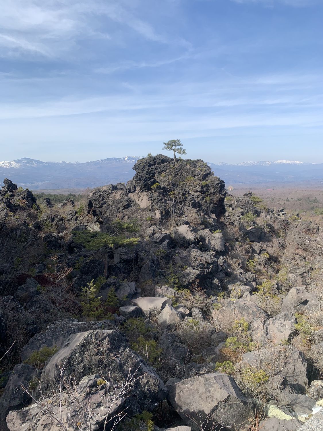 A volcanic landscape under a clear sky