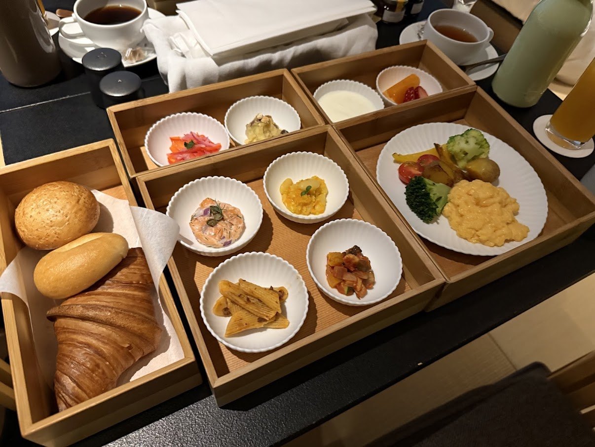 HOSHINOYA Tokyo Japanese breakfast served in stacked bamboo tiers with grilled sockeye salmon