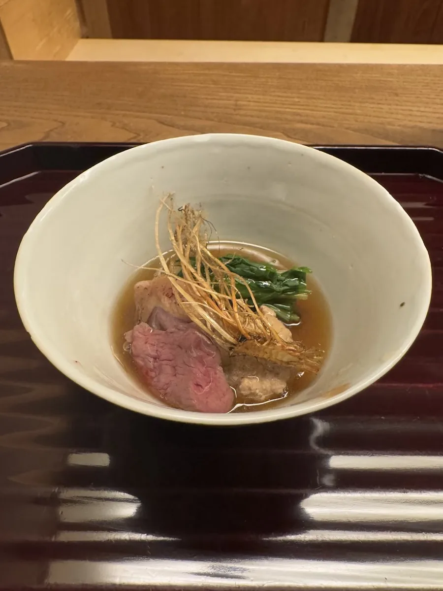 A kaiseki course plated on ceramic