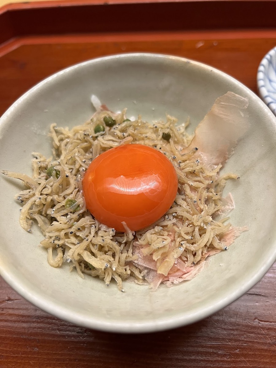 A kaiseki course plated with seasonal garnish