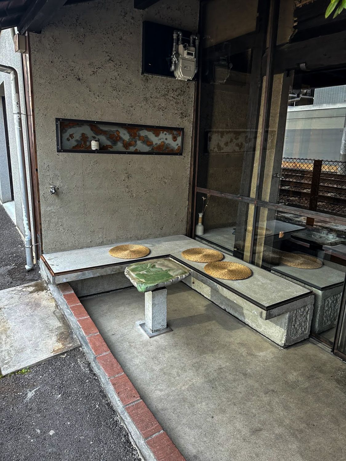 A tatami seating alcove in a modern Kyoto teahouse
