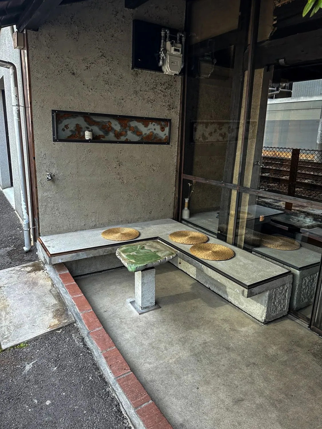 A tatami seating alcove in a modern Kyoto teahouse